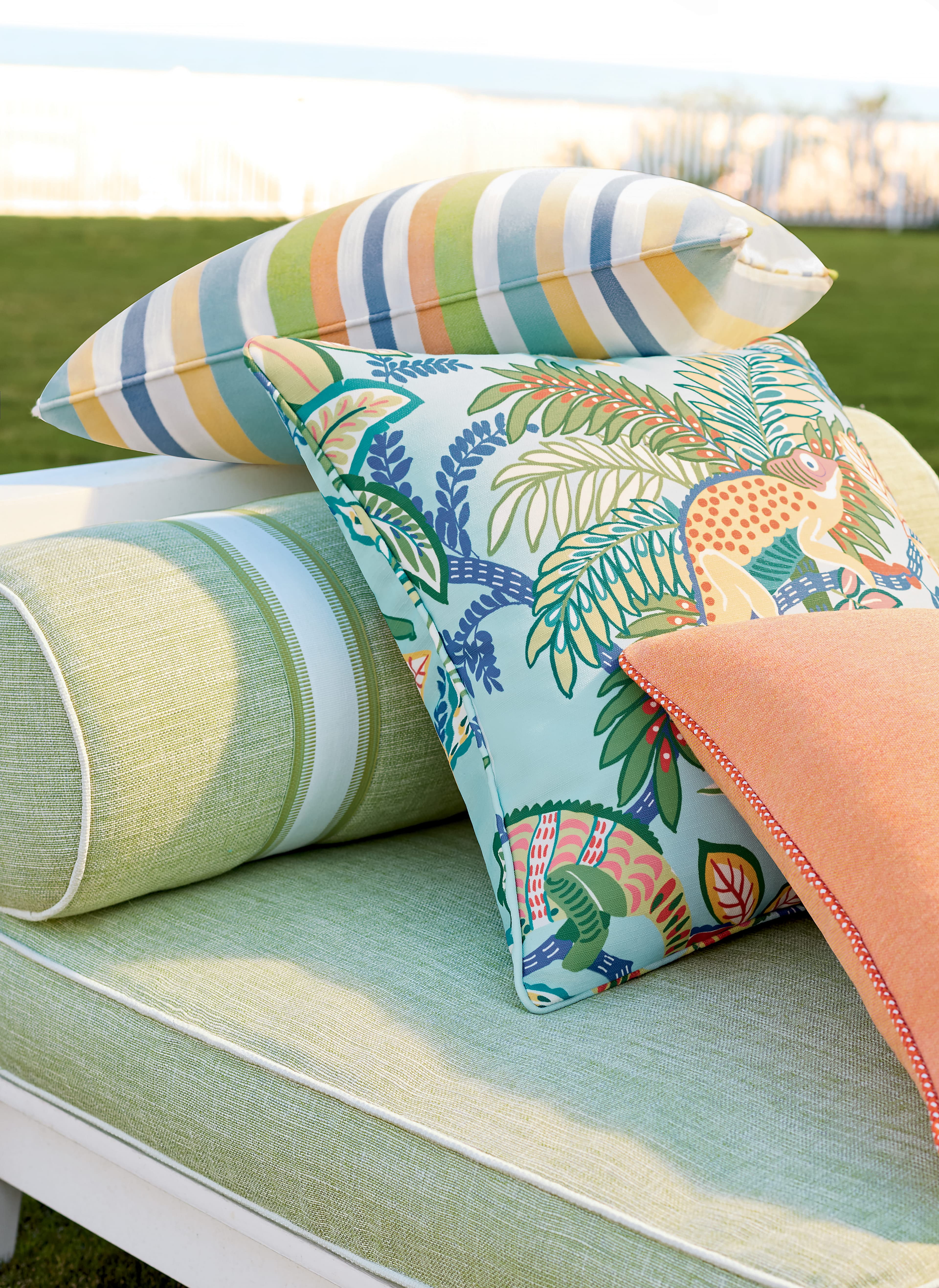 Poolside colour series — striped and tropical pillows