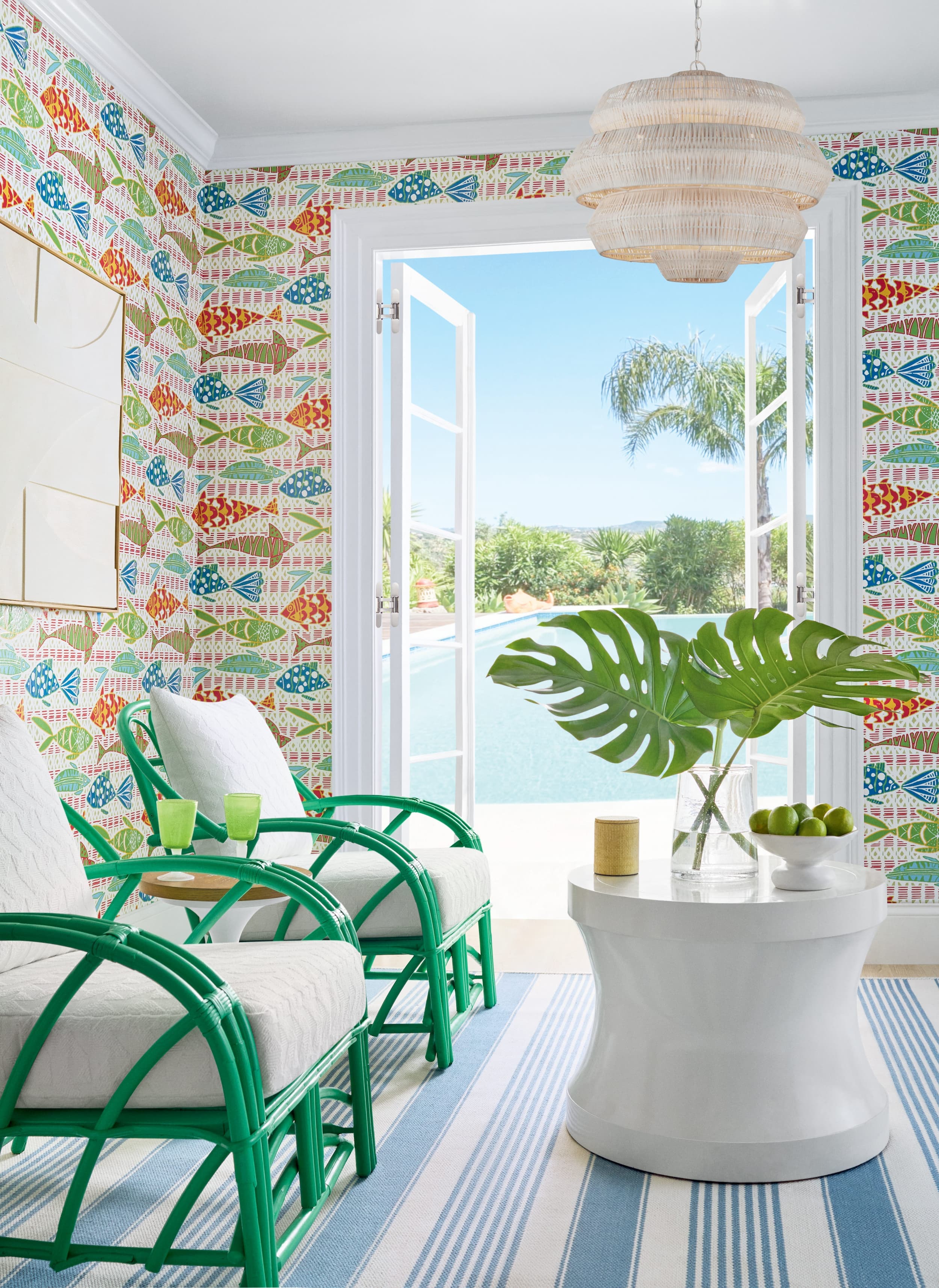 Batik Fish wallpaper in coral and blue — poolside room